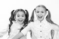 Schoolgirls with cute ponytails hairstyle and brilliant smiles. Best friends excellent pupils. Perfect schoolgirls tidy Royalty Free Stock Photo