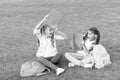 Schoolgirls little children school yard with books, learning language concept Royalty Free Stock Photo