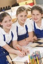 Schoolgirls in woodwork class Royalty Free Stock Photo