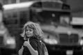 Schoolkid getting on the school bus. American School. Back to school. Kid of primary school. Happy children ready to Royalty Free Stock Photo