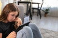 Schoolkid spending too much time on mobile device