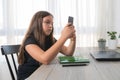 Schoolkid spending too much time on mobile device Royalty Free Stock Photo