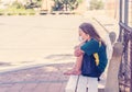 Schools closures Coronavirus lockdown. Bored and sad schoolgirl feeling depressed and lonely