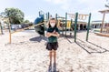 Schools closures Coronavirus lockdown. Bored school kid alone in playground feeling sad and lonely Royalty Free Stock Photo