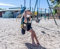 Schools closures Coronavirus lockdown. Bored school kid alone in playground feeling sad and lonely Royalty Free Stock Photo