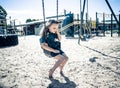 Schools closures Coronavirus lockdown. Bored school kid alone in playground feeling sad and lonely Royalty Free Stock Photo