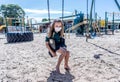 Schools closures Coronavirus lockdown. Bored school kid alone in playground feeling sad and lonely Royalty Free Stock Photo