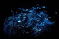schools of deep-sea creatures swimming in mesmerizing blue glow