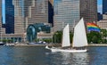 The Schooner Adirondack, flying a huge Pride flag, sails in the Hudson River in front of Winter Garden and Buildings of Brookfield Royalty Free Stock Photo