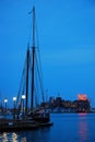 A schooner is docked at dusk in Inner Harbor, Baltimore