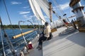 Schooner Sailboat Heeling from Wind Gust As Tourists Hold On Royalty Free Stock Photo