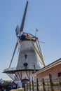 Schouwen-Duiveland, Zeeland, Netherlands. April 26, 2021. Side view of a Dutch windmill