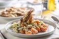 Schrimp and courgette risotto Italian style with a decorative tiger prawn on top Royalty Free Stock Photo