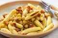 schupfnudel with bacon, onion and chick peas Royalty Free Stock Photo