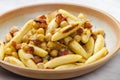 schupfnudel with bacon, onion and chick peas Royalty Free Stock Photo
