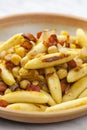 schupfnudel with bacon, onion and chick peas Royalty Free Stock Photo