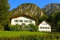 Houses with Alps Alpes, Alpen, Alpi, Alpe Mountain at the back, Schwangau Village, OstallgÃÂ¤u, Swabia Schwaben, Bavaria Bayern Royalty Free Stock Photo