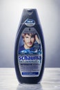 Schwarzkopf shampoo isolated on gradient background.