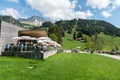 Schwarzsee, FR / Switzerland - 1 June 2019: tourists enjoy a day out and a break in the restaurant on the shores of Schwarzsee