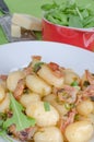 Schwarzwald gnocchi with ham, onion and wine