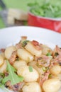 Schwarzwald gnocchi with ham, onion and wine