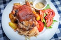 Schweinshaxe, pork hock baked with beer, bavarian traditional food plate