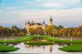 Schwerin castle seen from the park with colored foliage