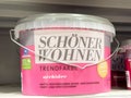 SchÃ¶ner wohnen trendfarbe orchidee paint bucket on shelf in store Royalty Free Stock Photo