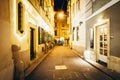 SchÃÂ¶nlaterngasse, a narrow alley at night, in Vienna, Austria.