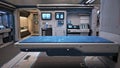 Sci fi futuristic interior of a medical bay with treatment bed and various healthcare equipment and medicines .