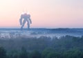 Sci-fi military giant battle machine. Humanoid robot in apocalypse countryside. Dystopia, science fiction, mech and