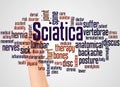 Sciatica word cloud and hand with marker concept