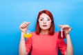 Science chemist girl with two flasks in hand