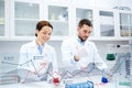 Young scientists making test or research in lab Royalty Free Stock Photo