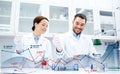 Young scientists making test or research in lab Royalty Free Stock Photo