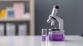 science classroom designs, a compound microscope and test tubes on a tidy lab table in a contemporary science classroom Royalty Free Stock Photo