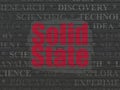 Science concept: Solid State on wall background Royalty Free Stock Photo