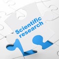 Science concept: Scientific Research on puzzle background Royalty Free Stock Photo