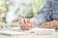 Science and education concept. Illustration of basic physics and mathematics formulas and woman working at table Royalty Free Stock Photo