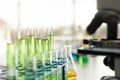 Science equipment in the laboratory. Beaker, test tube, microscope. Children STEM education theme