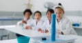 Science, experiment and chemical reaction with kids in a classroom at school for education or development. Learning, wow Royalty Free Stock Photo