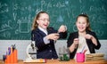 Science experiments in laboratory. Biology lab. Happy Genius. Chemistry research in laboratory. Little girls scientist