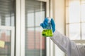 Science and Healthcare Concept. Closeup of docter scientists hand holding green liquid chemicals flask in a laboratory