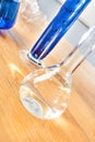 Science laboratory beaker made in glass on the table Royalty Free Stock Photo