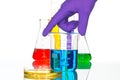 Science Laboratory glassware pipette drop, reflective white back Royalty Free Stock Photo