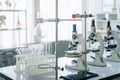 Science laboratory, Microscope and test tubes on the working table chemistry laboratory, scientist test tube with samples Royalty Free Stock Photo