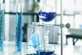 Science laboratory test tubes, glassware medical equipment for chemistry biology test samples. Liquid, Blue tone, Research, develo