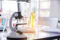 Science microscope equipment in biology chemical laboratory. Scientific experiment Microscope on Lab table microbiology equipment Royalty Free Stock Photo