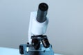 Science. Microscope with glass slide on blurred background, closeup Royalty Free Stock Photo