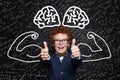 Science power. Happy child student on blackboard with science formulas Royalty Free Stock Photo